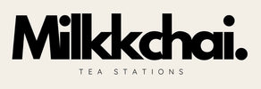 Logo of Milkkchai with black text on a creme background.

